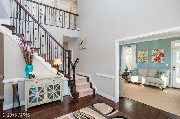 Look Inside $600K Model Home w/ Wraparound Front Porch, Luxurious Master Bathroom, More