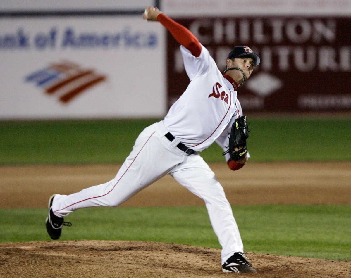 Clay Buchholz pitches for the Portland Sea Dogs in Maine in 2008. The Sea Dogs are the Double-A minor league affiliate of the Boston Red Sox. On Sunday, MLB said it will offer some minor leaguers housing.