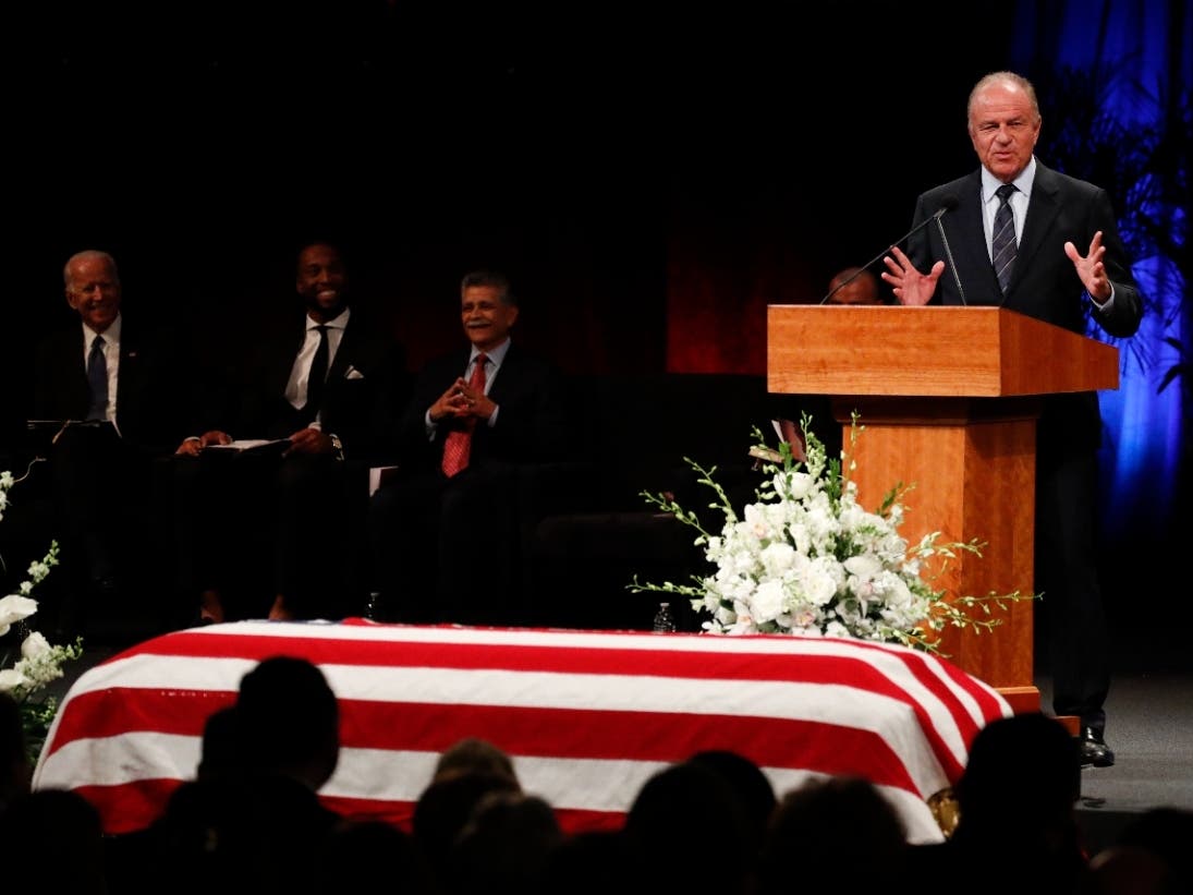 Former Arizona Attorney General Grant Woods speaks during a memorial service for John McCain in 2018. Woods, a key McCain ally unafraid to reach across the aisle, died Saturday at 67.