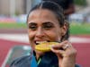 Union Catholic's own Sydney McLaughlin-Levrone bites down on her existing gold medal; she already won two at the 2020 Tokyo Olympics. She is expected to dominate again this summer in Paris.