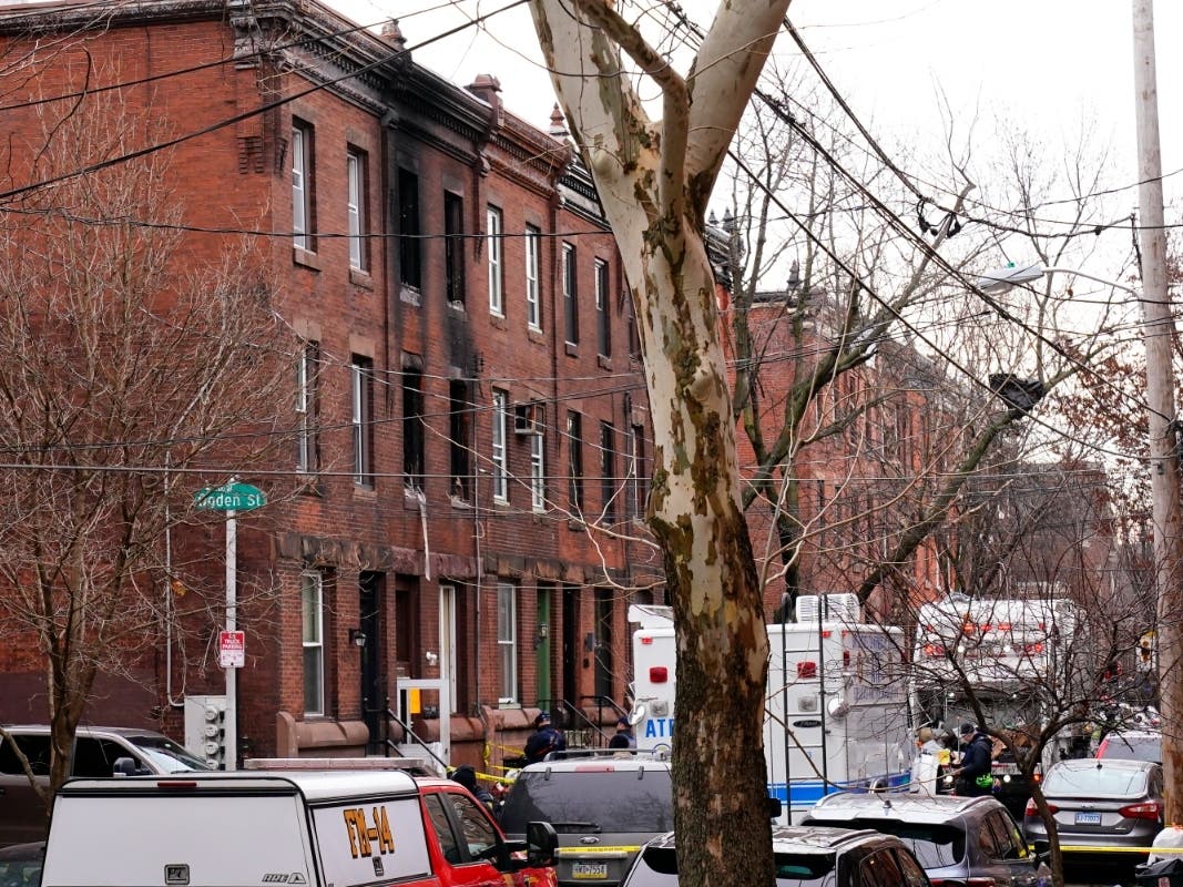 Soot covers the exterior wall of the building of Wednesday's fatal fire in the Fairmount neighborhood of Philadelphia, Thursday. Officials say it's the city's deadliest single fire in at least a century. 