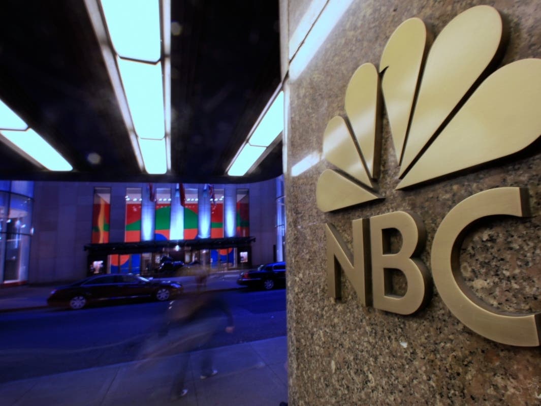 This Aug. 21, 2009, file photo shows the NBC logo at its headquarters in New York.