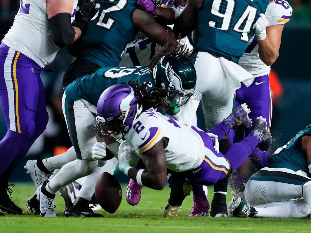 Minnesota Vikings running back Alexander Mattison (2) fumbles the ball during the first half of an NFL football game against the Philadelphia Eagles on Thursday, Sept. 14, 2023, in Philadelphia.