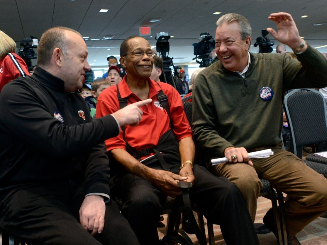 Minnesota Twins President Dave St. Peter, left, Hall of Fame member and former Minnesota Twins baseball player Rod Carew, and broadcaster Dick Bremer speak to each other during TwinsFest, Saturday, Jan. 30, 2016, in Minneapolis.