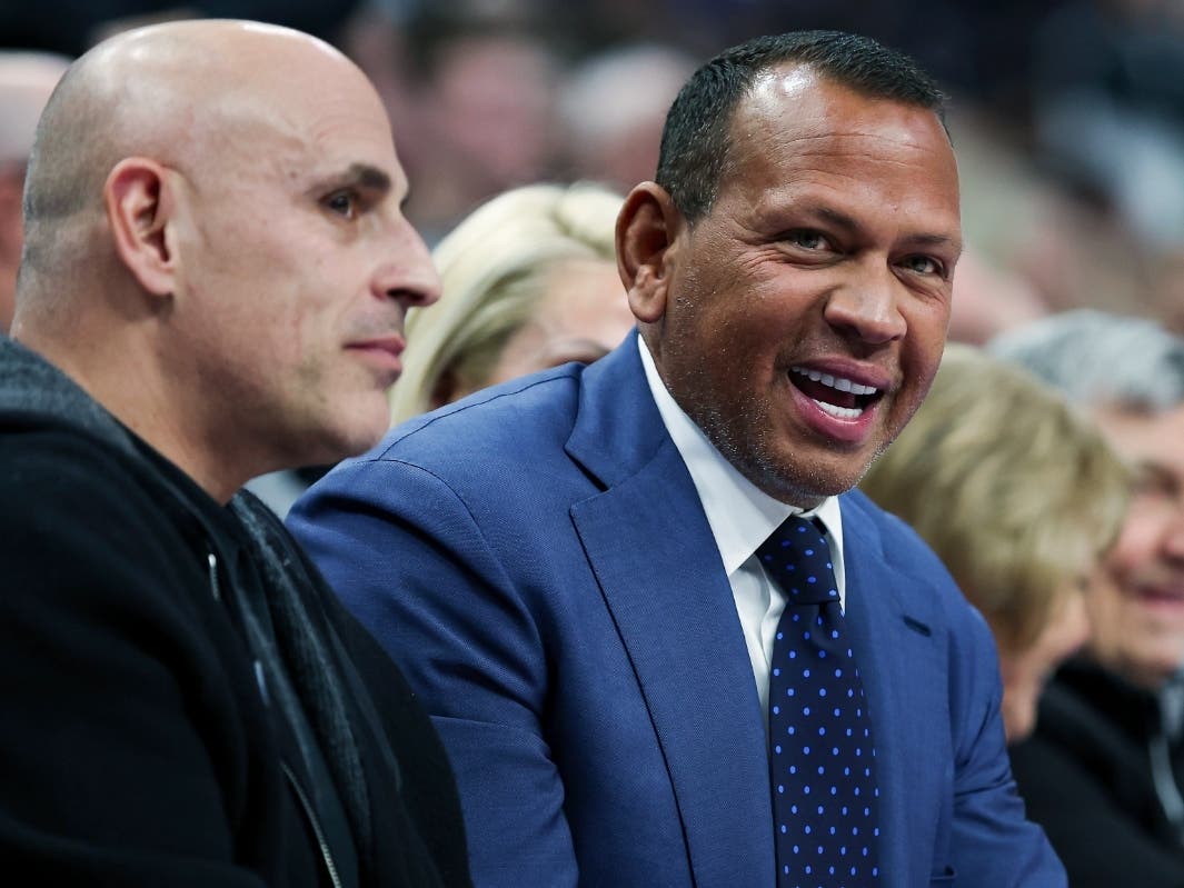 Minnesota Timberwolves co-owners Alex Rodriguez, right, and Marc Lore watch during the first half of an NBA basketball game between Timberwolves and Los Angeles Lakers on Saturday, Dec. 30, 2023, in Minneapolis. 