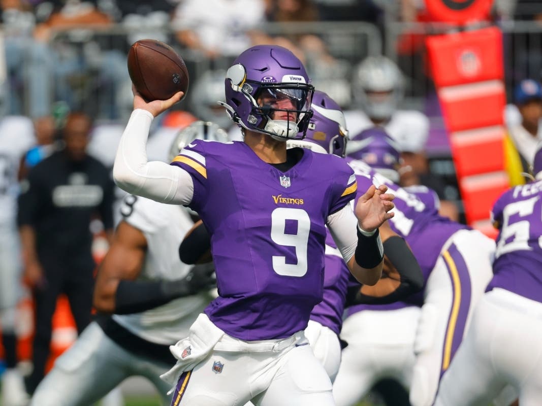 Minnesota Vikings quarterback J.J. McCarthy (9) throws against the Las Vegas Raiders during the first half of an NFL football game Saturday, Aug. 10, 2024, in Minneapolis.