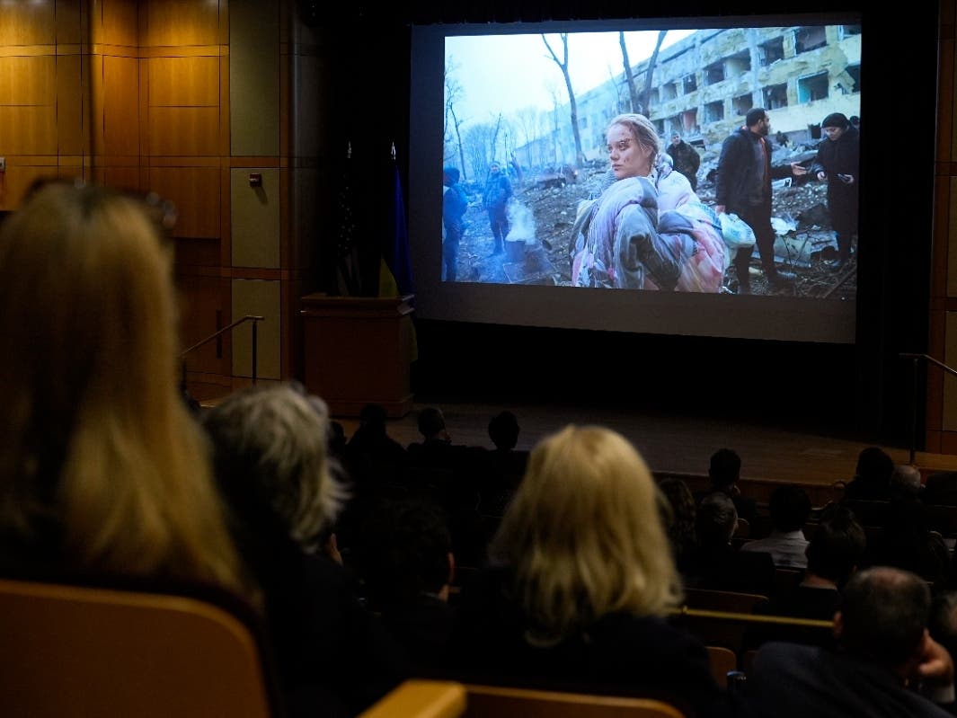 People watch a screening of "20 Days in Mariupol" at the State Department in Washington, in February 2024. 