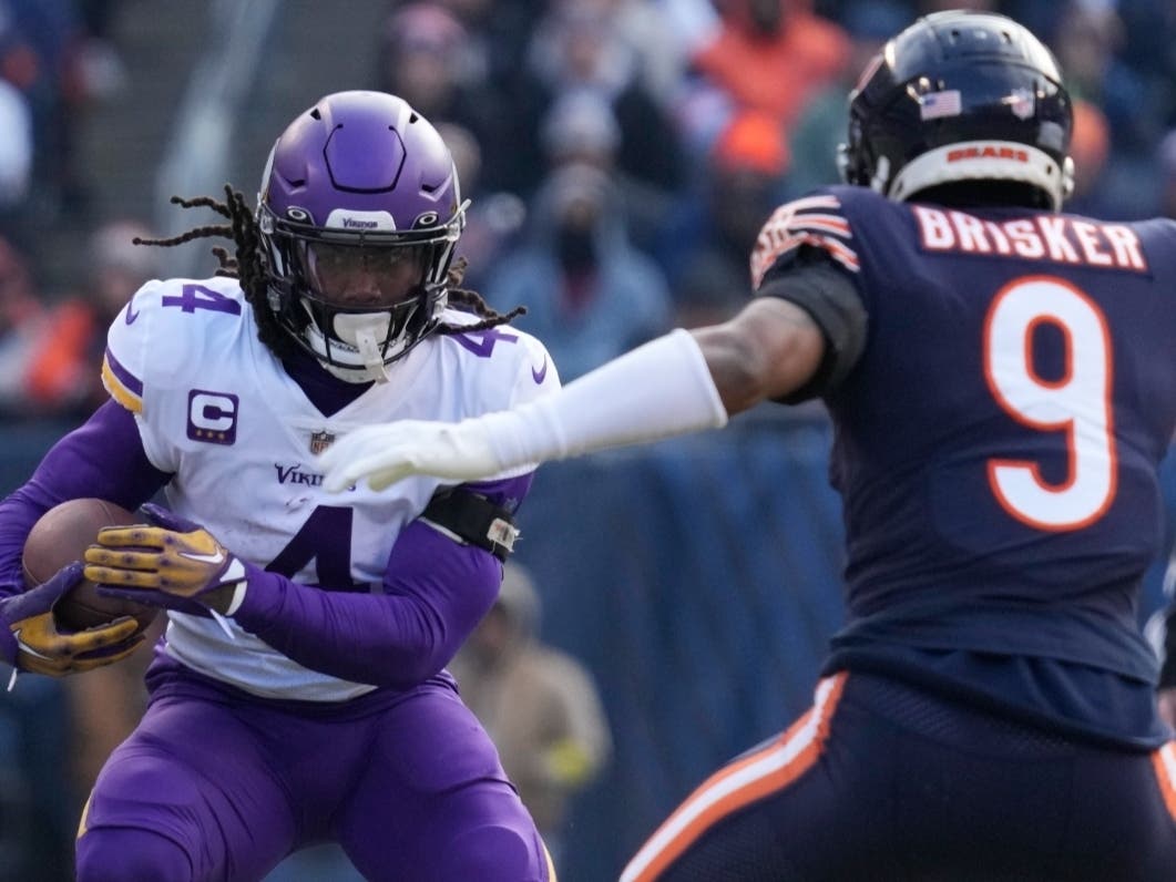 Minnesota Vikings running back Dalvin Cook runs against the Chicago Bears during the first half of an NFL football game on Jan. 8, 2023, in Chicago.