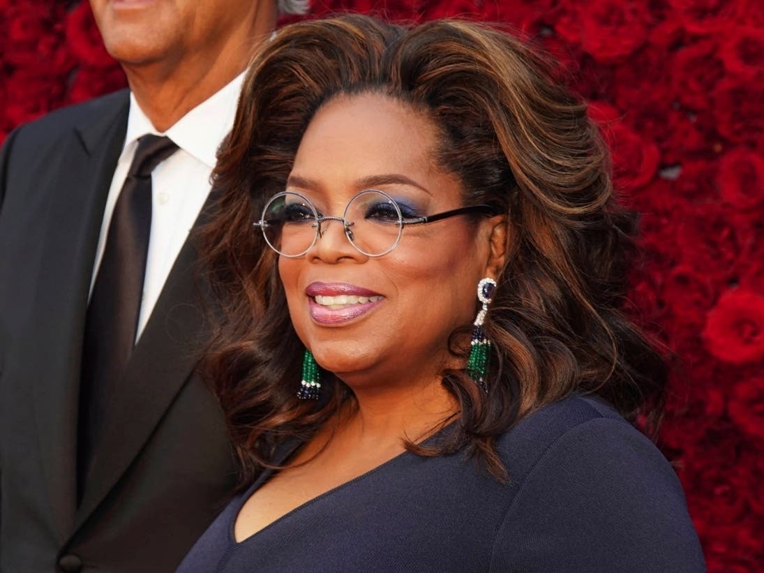 Oprah Winfrey poses for a photo on the red carpet at the grand opening of Tyler Perry Studios on Saturday, Oct. 5, 2019, in Atlanta.