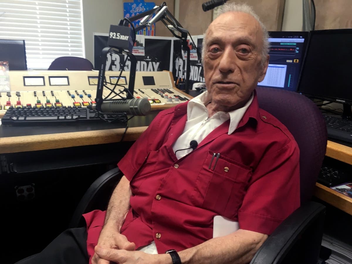 DJ Art Laboe sits in his studio and talks about his 75 years in the radio business on Oct. 9, 2018, in Palm Springs, Calif. Laboe, a pioneering disc jockey who hosted a syndicated oldies show for decades, died Friday, Oct. 7, 2022. 