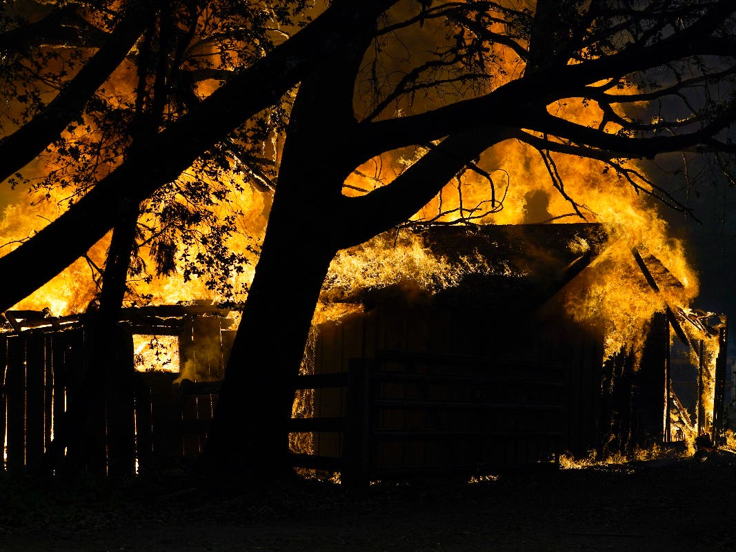 A structure is damaged by the CZU August Lightning Complex Fire in Thursday, Aug. 20, 2020, in Bonny Doon, Calif. 