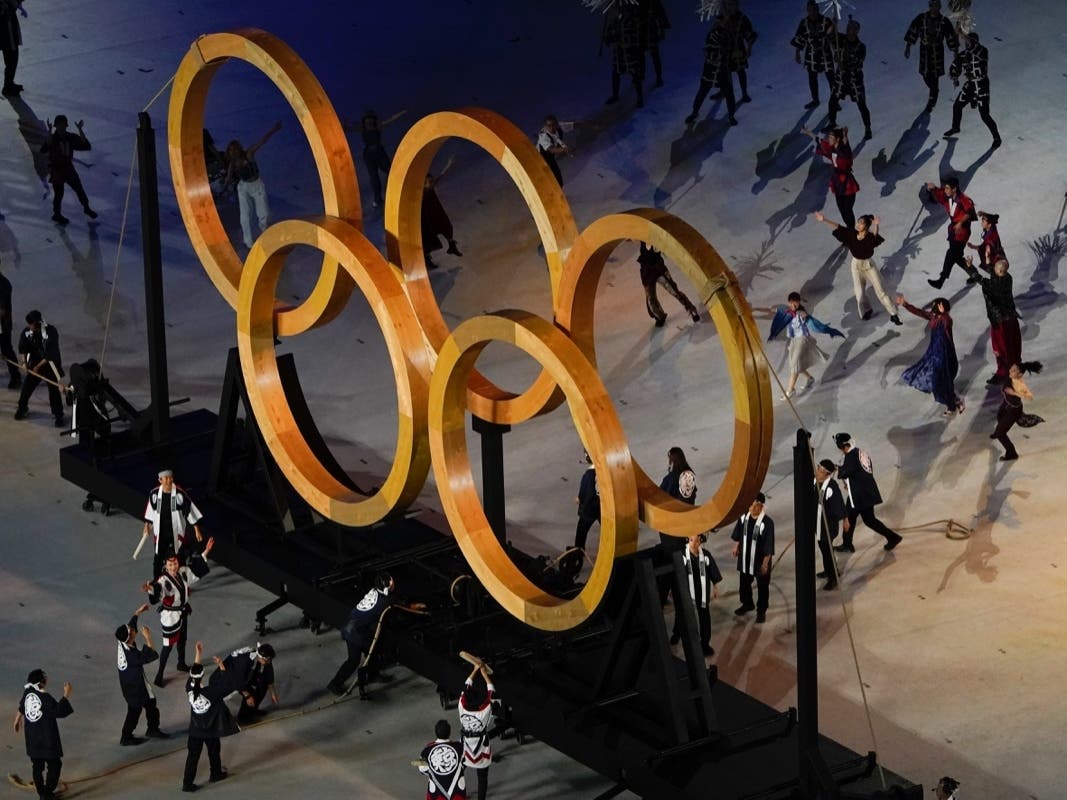 With muted ceremony and empty stadium, Tokyo Olympics begin Actors perform during the opening ceremony at the Olympic Stadium at the 2020 Summer Olympics on Friday.