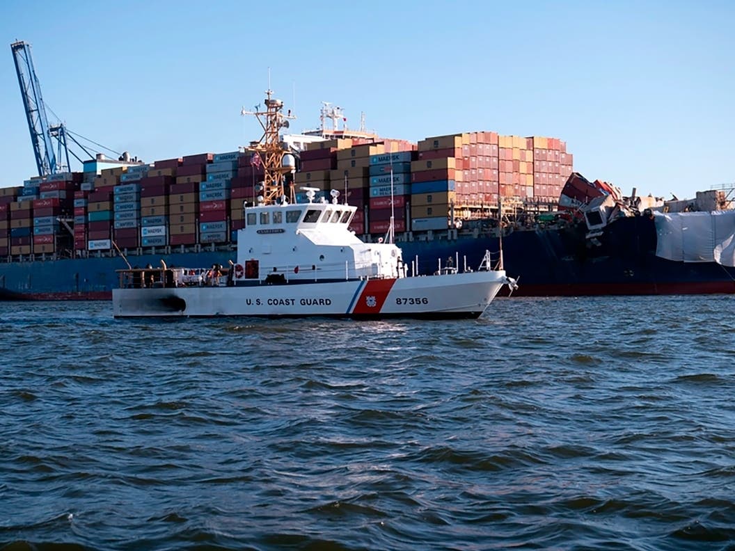 U.S. Coast Guard Cutter Sailfish, an 87-foot Marine Protector class vessel, escorts the Motor Vessel Dali during its transit from the Port of Baltimore to the Port of Virginia, Monday, June 24, 2024.