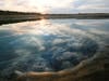 Oil floats on the water surface after an oil spill in Huntington Beach, Calif., on Monday, Oct. 4, 2021. 