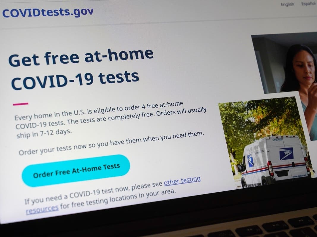 A United States government website is displayed on a computer that features a page where people can order free, at-home COVID-19 tests. The website, COVIDTests.gov, allows people to order four at-home tests per residence and have them mailed.