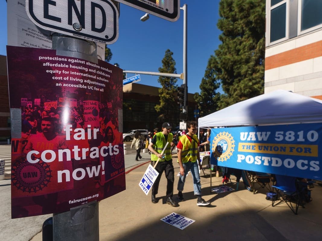 People participate in a protest outside the UCLA campus in Los Angeles, Monday, Nov. 14, 2022.