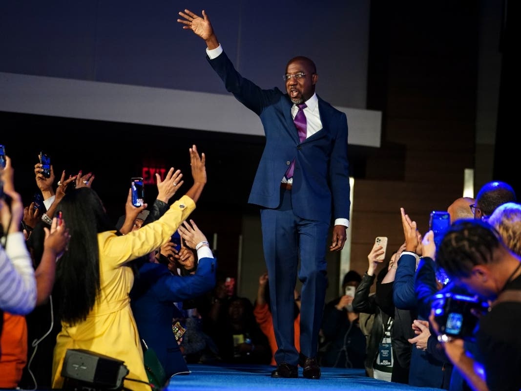 Democratic Sen. Raphael Warnock speaks during an election night watch party, Tuesday, Dec. 6, 2022, in Atlanta. Democratic Sen. Raphael Warnock has defeated Republican challenger Herschel Walker in a runoff election in Georgia. 