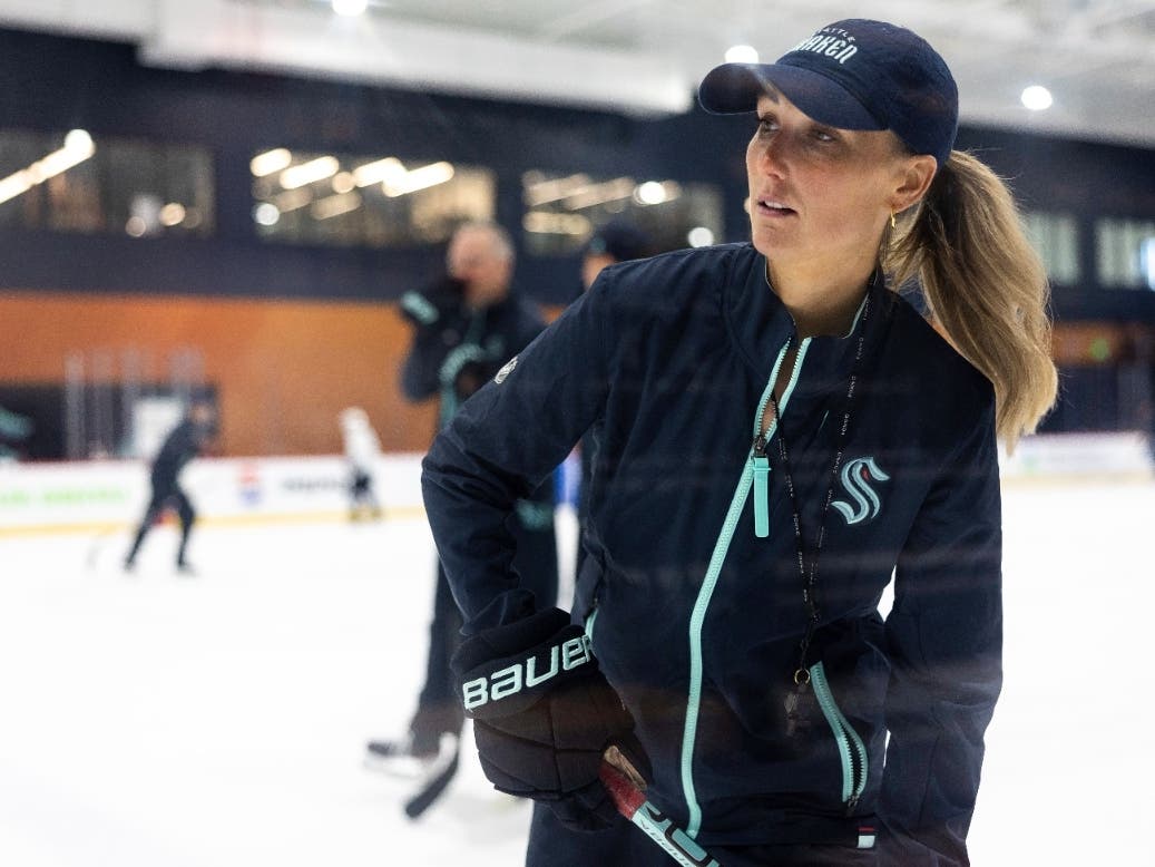 Jessica Campbell runs a drill during a Seattle Kraken rookie development camp on Tuesday, July 2, 2024, in Seattle. Campbell will become the first woman to work on the bench of an NHL franchise after the Seattle Kraken hired her as an assistant coach.