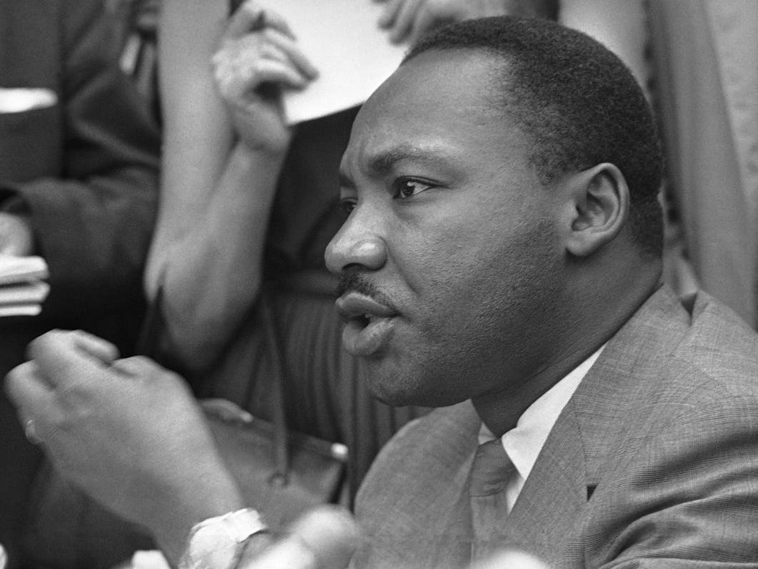 Rev. Martin Luther King Jr., Black integration leader, announces that a bi-racial committee had reached agreement on two of the four points the Blacks had been demonstrating for during the previous month in Birmingham, Alabama, May 9, 1963.