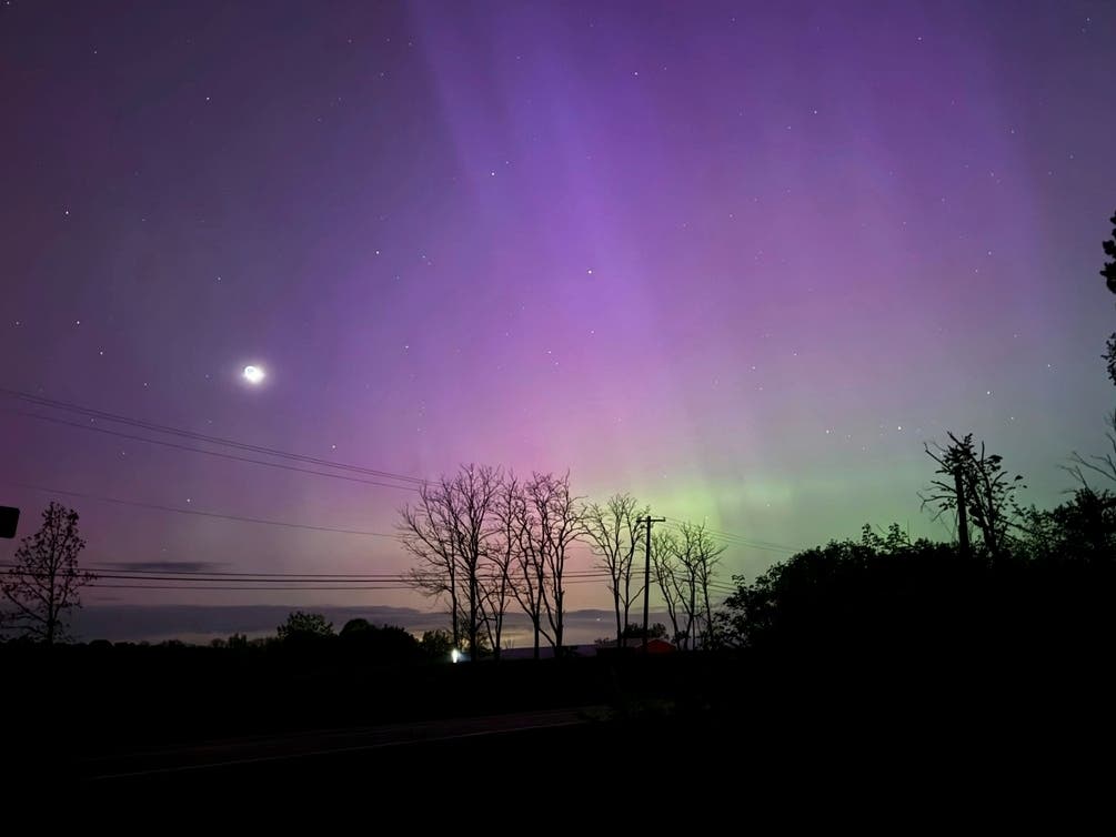 The northern lights could dip down to northern Missouri overnight Monday. However, predicting the timing of the aurra is tricky, but especially so with more big flares heading toward Earth. This photo shows the aurora over Ann Arbor, Michigan, on May 11.