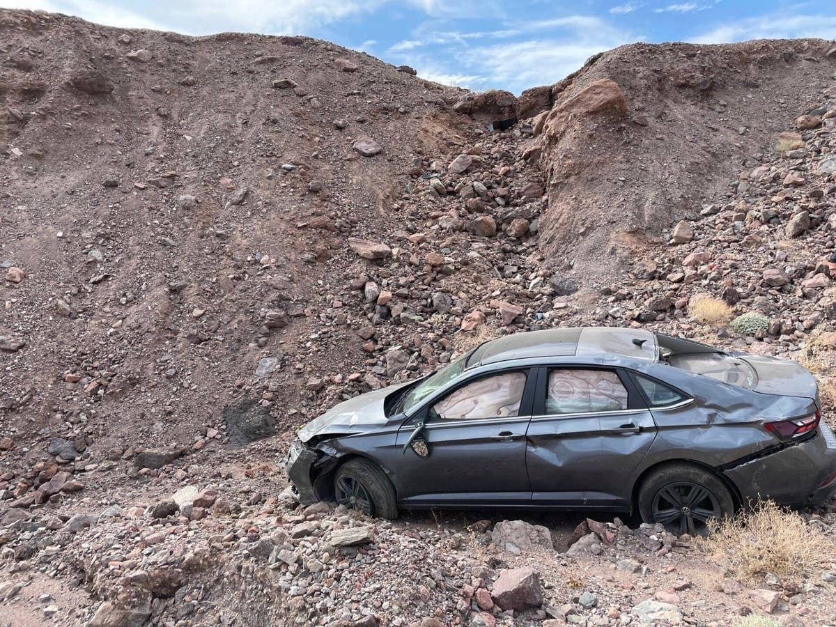 This image provided by the National Park Service shows a car owned by Peter Hayes Robino of Duarte, who drove off a 20-foot embankment at the edge of the parking lot at Death Valley National Park, on Aug. 1, 2024, and died of hyperthermia, or overheating.