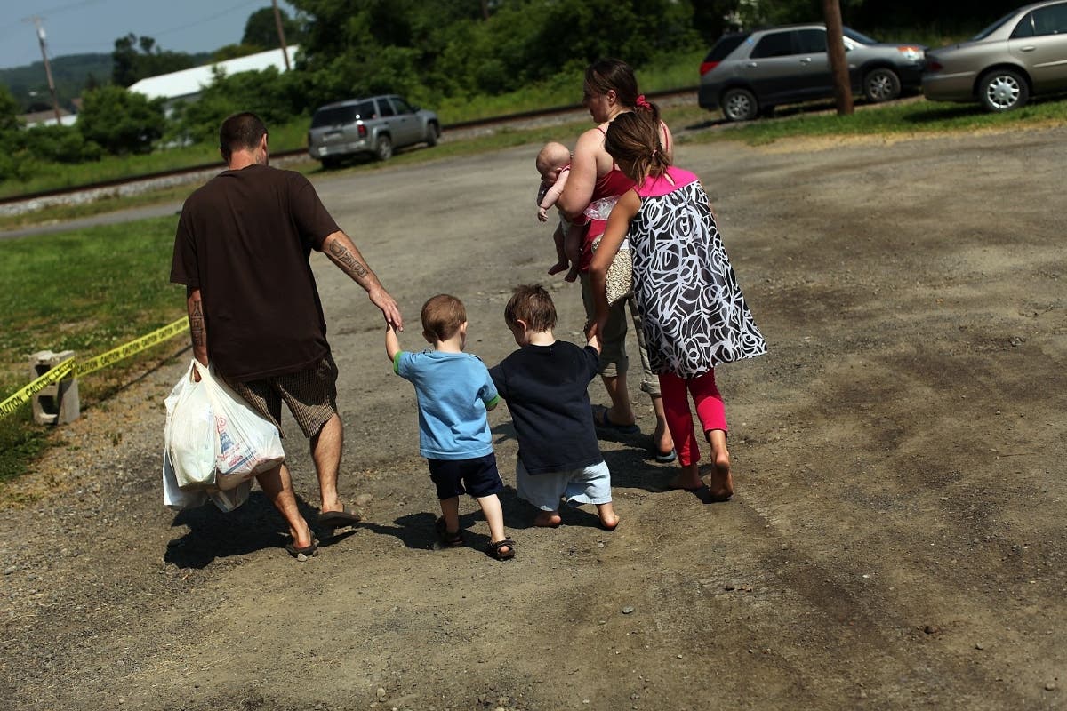 These parents depend on their local food pantry to provide nutritious food for their children.