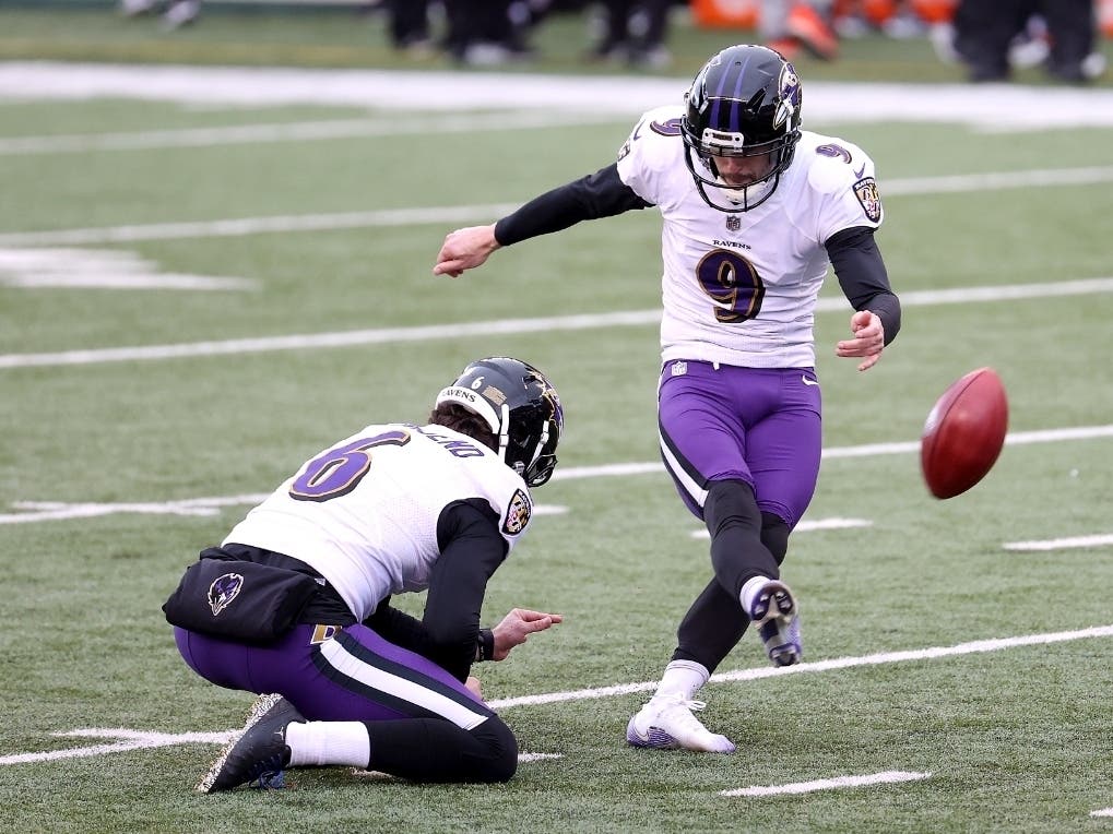 Baltimore Ravens kicker Justin Tucker, shown here during a game last season against the Cincinnati Bengals, kicked a 66-yard field goal to win the game for the Ravens on Sunday.