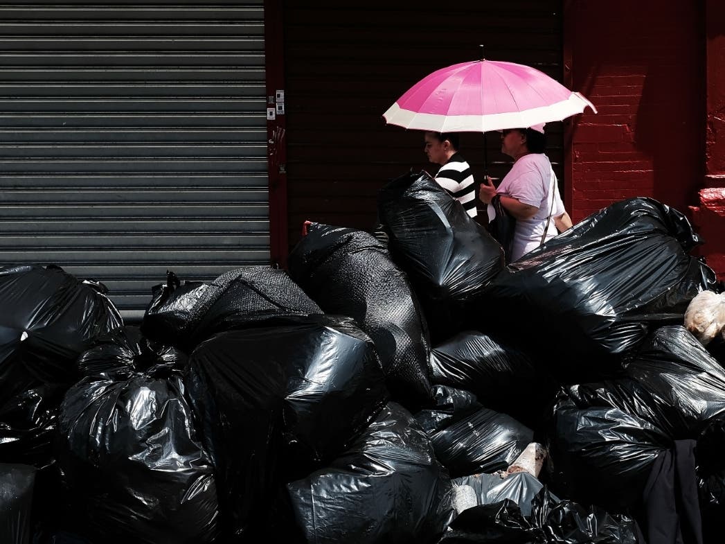 Hell's Kitchen residents organized a garbage dump in a parking spot. The city ordered them to shut it down.