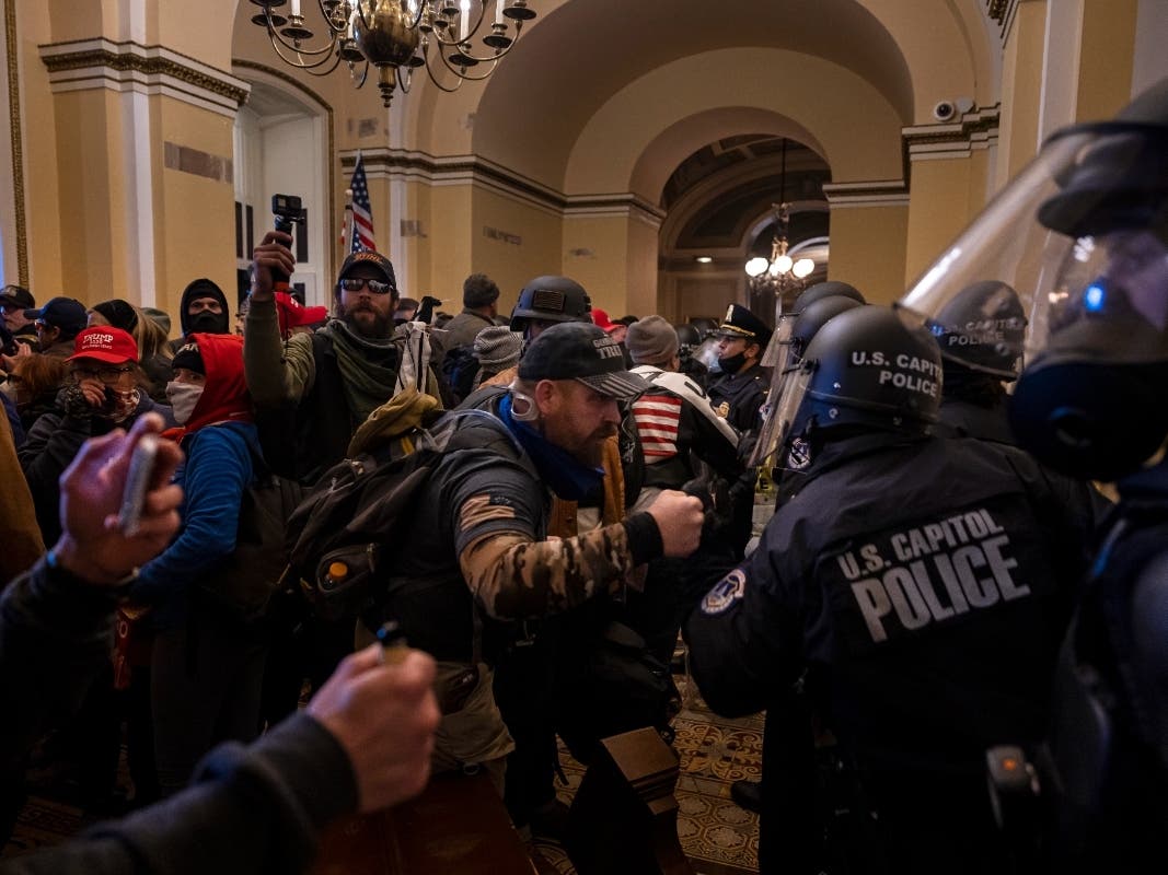 More than 700 people have been arrested and charged with storming the U.S. Capitol in a riot on Jan. 6, 2021.