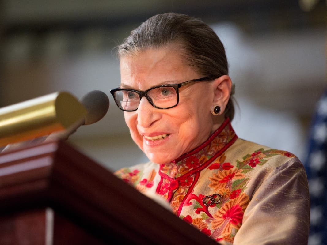 U.S. Supreme Court Justice Ruth Bader Ginsburg speaks at an annual Women's History Month reception hosted by Pelosi in the U.S. capitol building on Capitol Hill in Washington, D.C. 