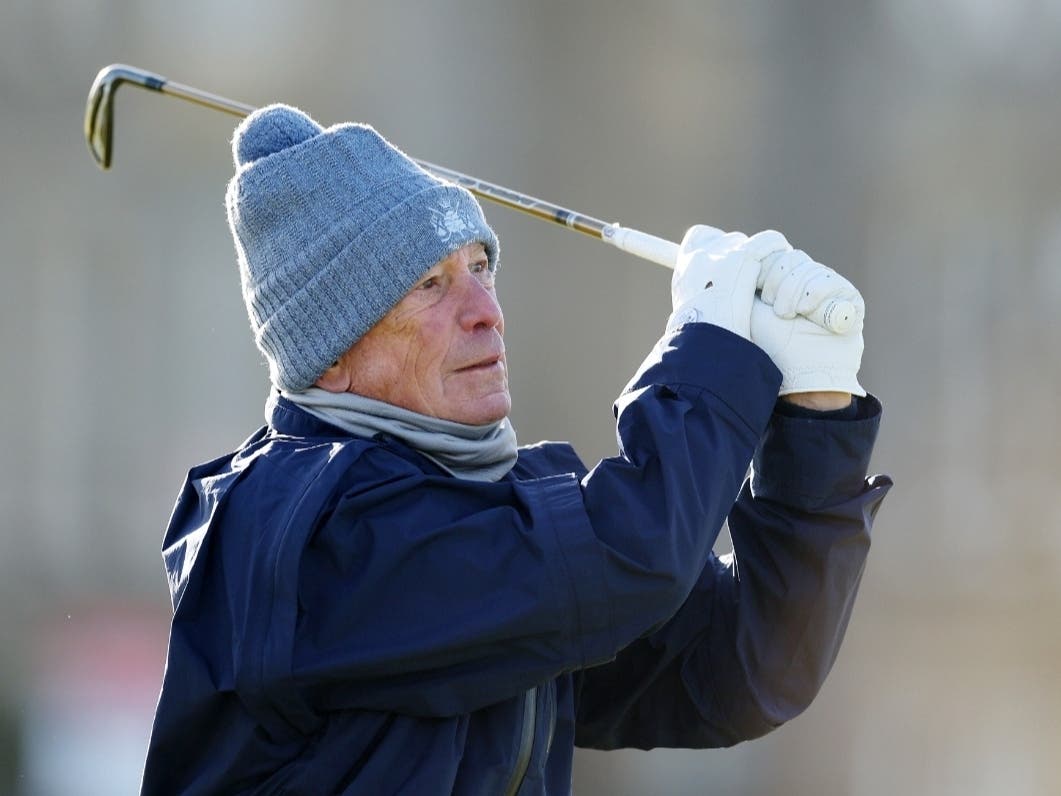 Mike Bloomberg, former mayor of New York City, plays their shot onto the green on the 1st hole on Day Three of the Alfred Dunhill Links Championship on the Old Course St. Andrews on Oct. 1, 2022, in St Andrews, Scotland. 