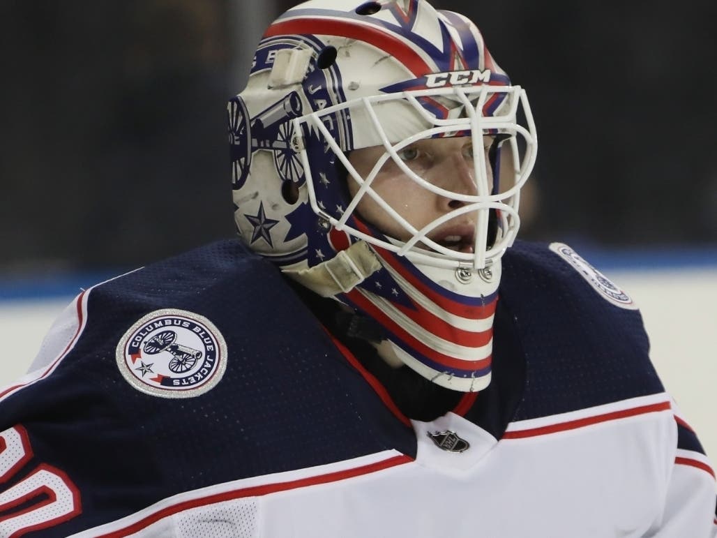 Matiss Kivlenieks, No. 80 of the Columbus Blue Jackets, tends net in his first NHL game against the New York Rangers at Madison Square Garden on Jan. 19, 2020 in New York City. The Blue Jackets defeated the Rangers 2-1. Kivlenieks has died. 