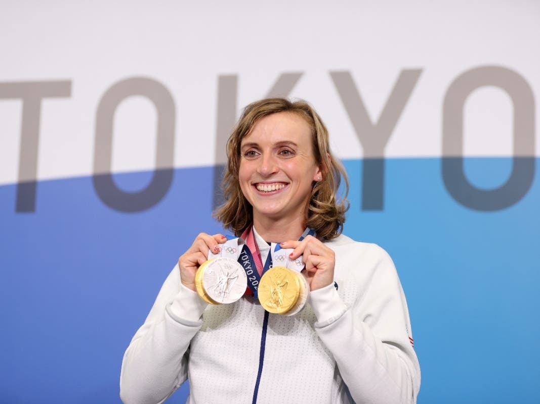 Katie Ledecky of Team USA poses with her two Gold and two Silver medals after a giving a press conference to the media during the Tokyo Olympic Games on July 31, 2021 in Tokyo, Japan.