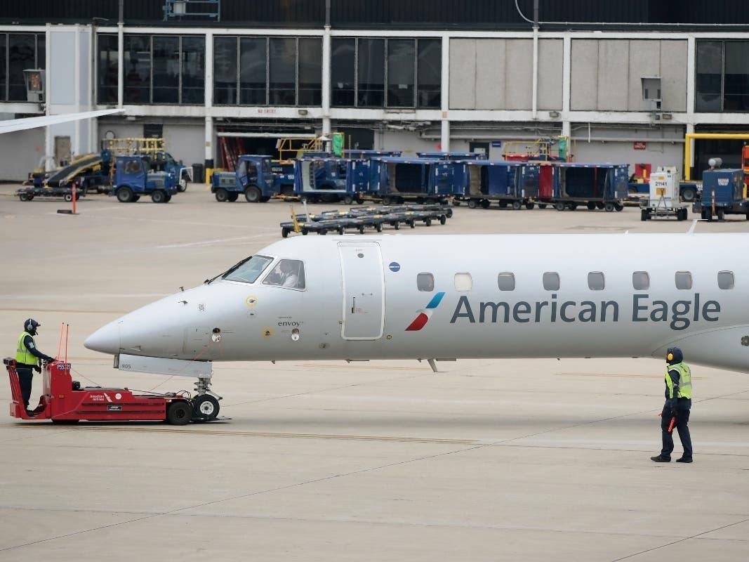   An American Airlines aricraft is prepared for flight at O'Hare International Airport on May 11, 2018 in Chicago, Illinois. Today American Airlines held a ceremony to mark the opening of five new gate at the airport.
