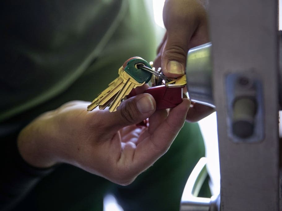 An apartment maintenance man changes the lock of a Phoenix apartment after constables posted an eviction order. House Democrats on Friday said they won't vote to extend the federal eviction moratorium ending July 31. 