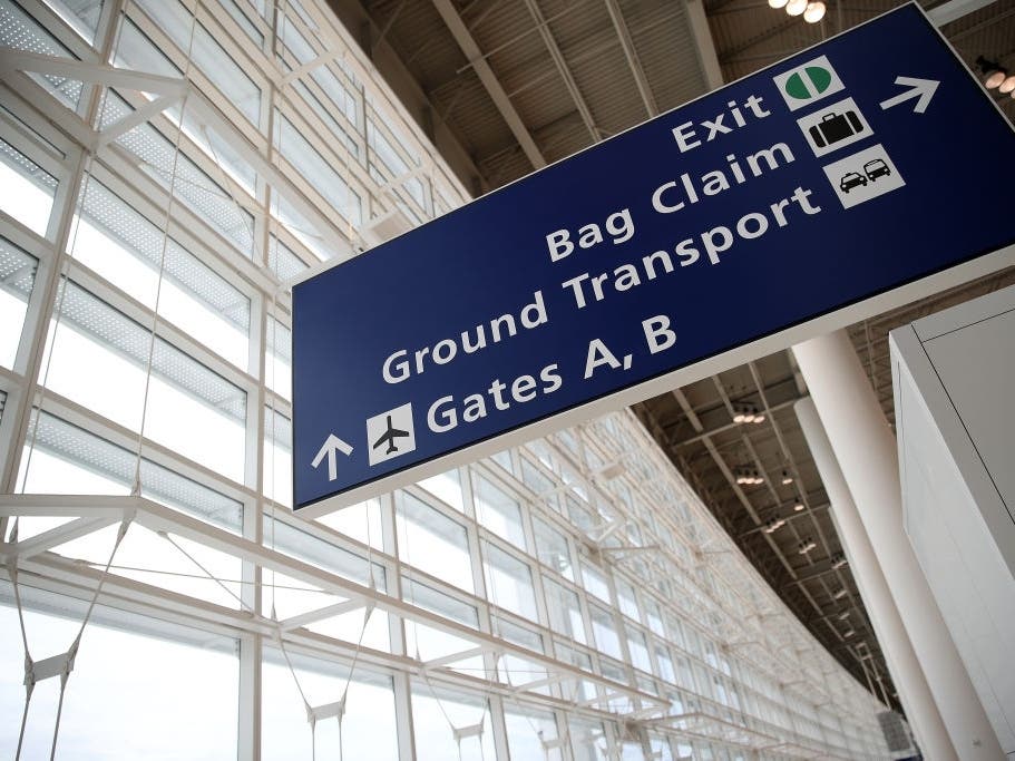 A baggage handler at Louis Armstrong New Orleans​ International Airport died Tuesday after her hair became caught in a belt loader while she unloaded luggage from an inbound flight.