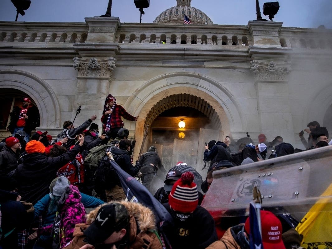 Supporters of then-President Donald clash with police and security forces as people try to storm the U.S. Capitol on Jan. 6 in Washington, D.C. 