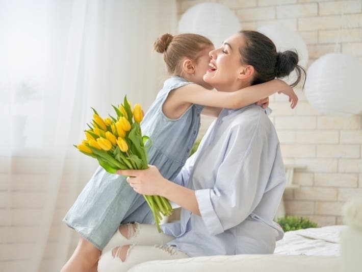 We want to celebrate moms by inviting our readers to share their favorite mother-daughter or mother-son photos and sentiments for Mother's Day 2021.