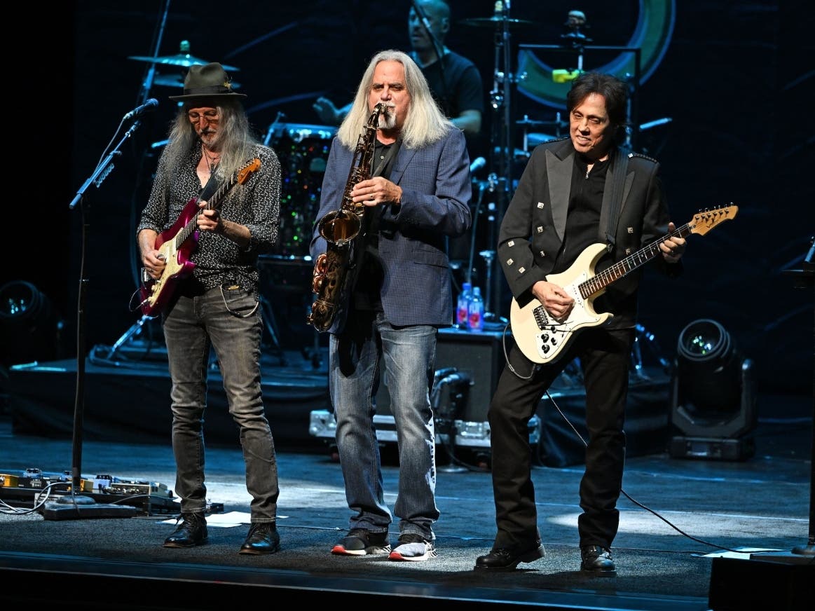 Patrick Simmons, Marc Russo, and John McFee of The Doobie Brothers perform during the 50th Anniversary Tour. The group performed in Camden, N.J., on Saturday night.