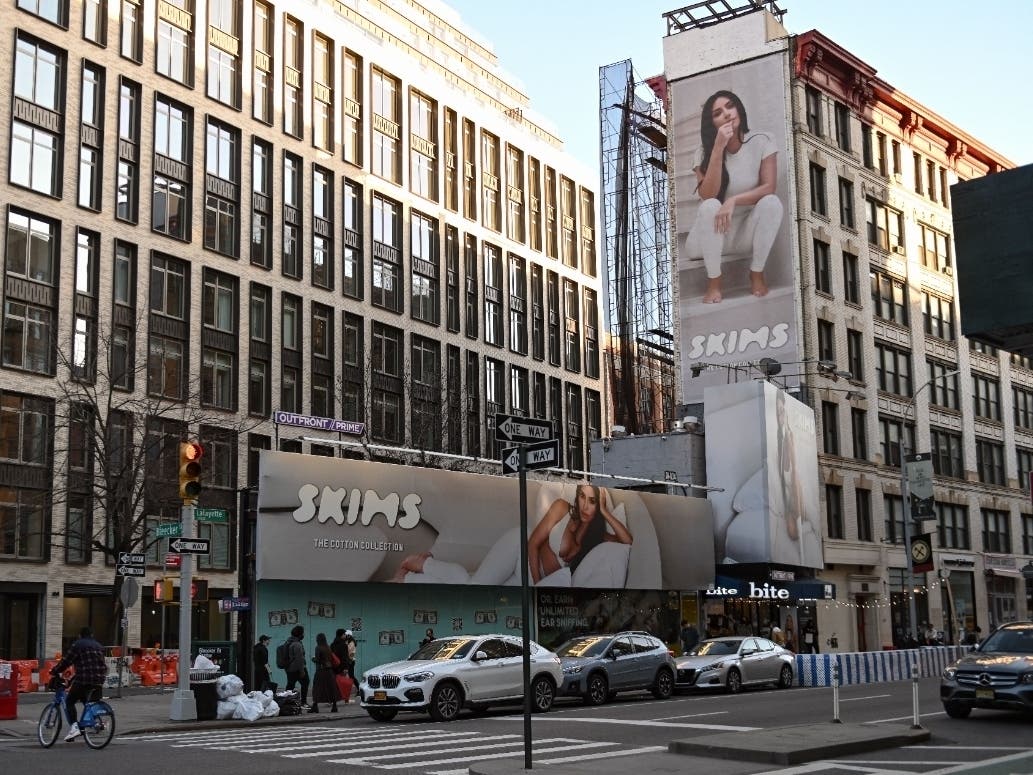 In this file photo, a billboard in NoHo advertises Kim Kardashian's Skims clothing line. The fashion and reality TV icon announced Monday Skims has been tapped to provide loungewear for Team USA in the Tokyo Olympics.