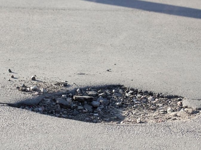 The Maryland State Highway Administration spends about $3 million a year patching potholes