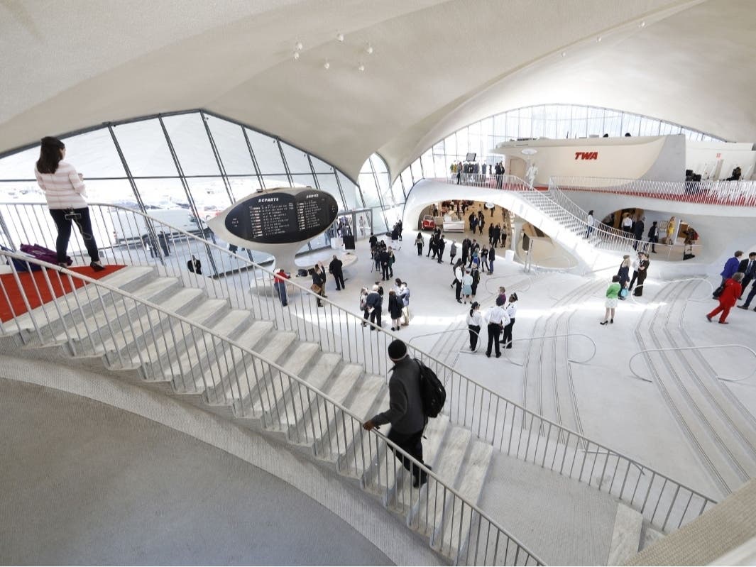 Sights of the old TWA Terminal are viewed by members of the media at a press tour at the grand opening of the TWA Hotel at JFK Airport on May 15, 2019 in New York City.