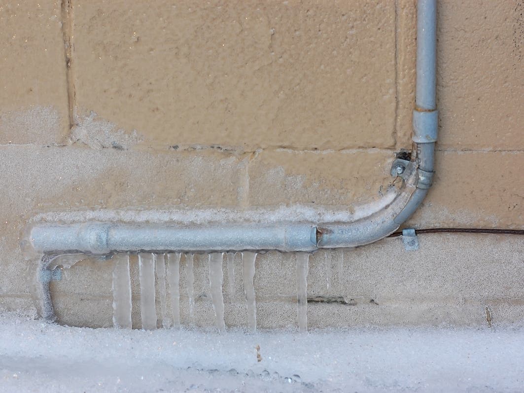 If a pipe is frozen and leaking, it's best to shut off the water and contact a plumber, according to the Northbrook DPW. 