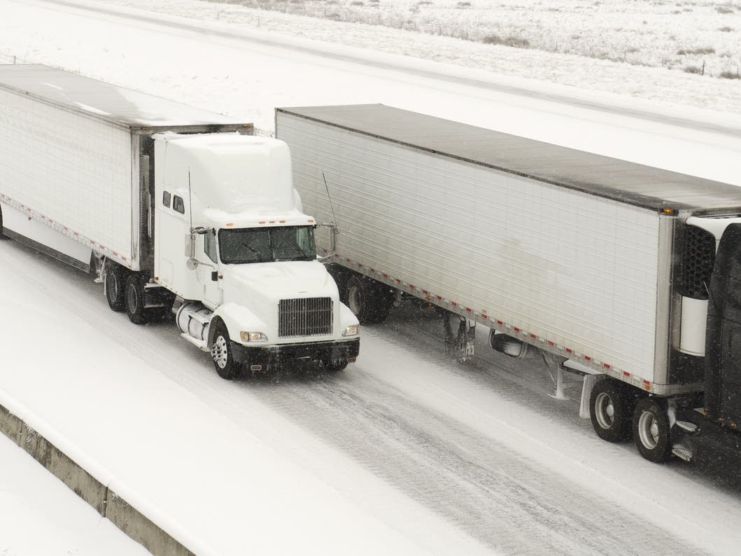 A cold storm washing over Southern California will bring snow levels low as temperatures drop below freezing.