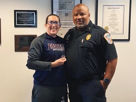 Morgan Bolduk was presented a Challenge Coin by Eastern Police Chief Stephen Tavares for her efforts in a recent classroom emergency.