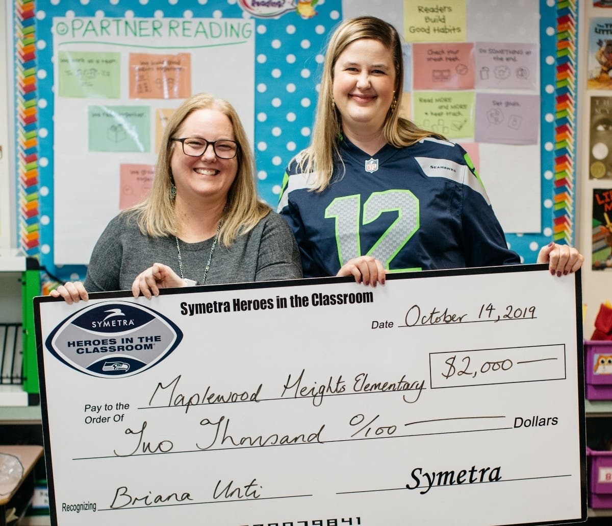 Maplewood Hts. Principal Tamra Prince and 2019 Symetra Heroes in the Classroom honoree Briana Unti.