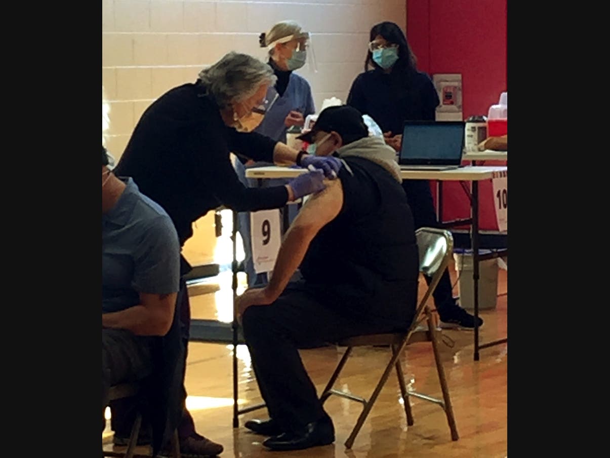 A coronavirus vaccination clinic is conducted in New Haven, Connecticut.