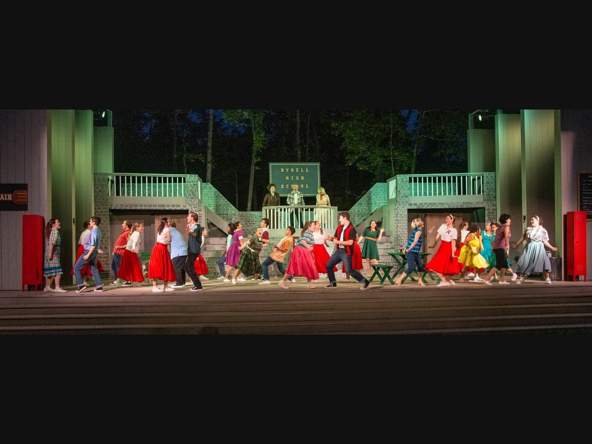 The Burger Palace Boys and friends take to the street to sing the praises of Kenickie's car "Greased LIghtnin" in "Grease," the beloved rock'n'roll musical about 1950s high school life now playing through August 10