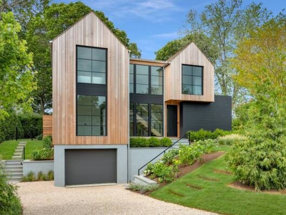 This recently constructed $4.5 million western facing modern barn style home ​is located in Sag Harbor's sought after Bay Point.