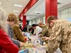 German Armed Forces Command members join local community volunteers at Herndon MS to sort nearly 3,400 pounds of food and toiletries to help local students grow and learn. Food For Neighbors delivered an additional 1,350 pounds directly to South Lakes HS.